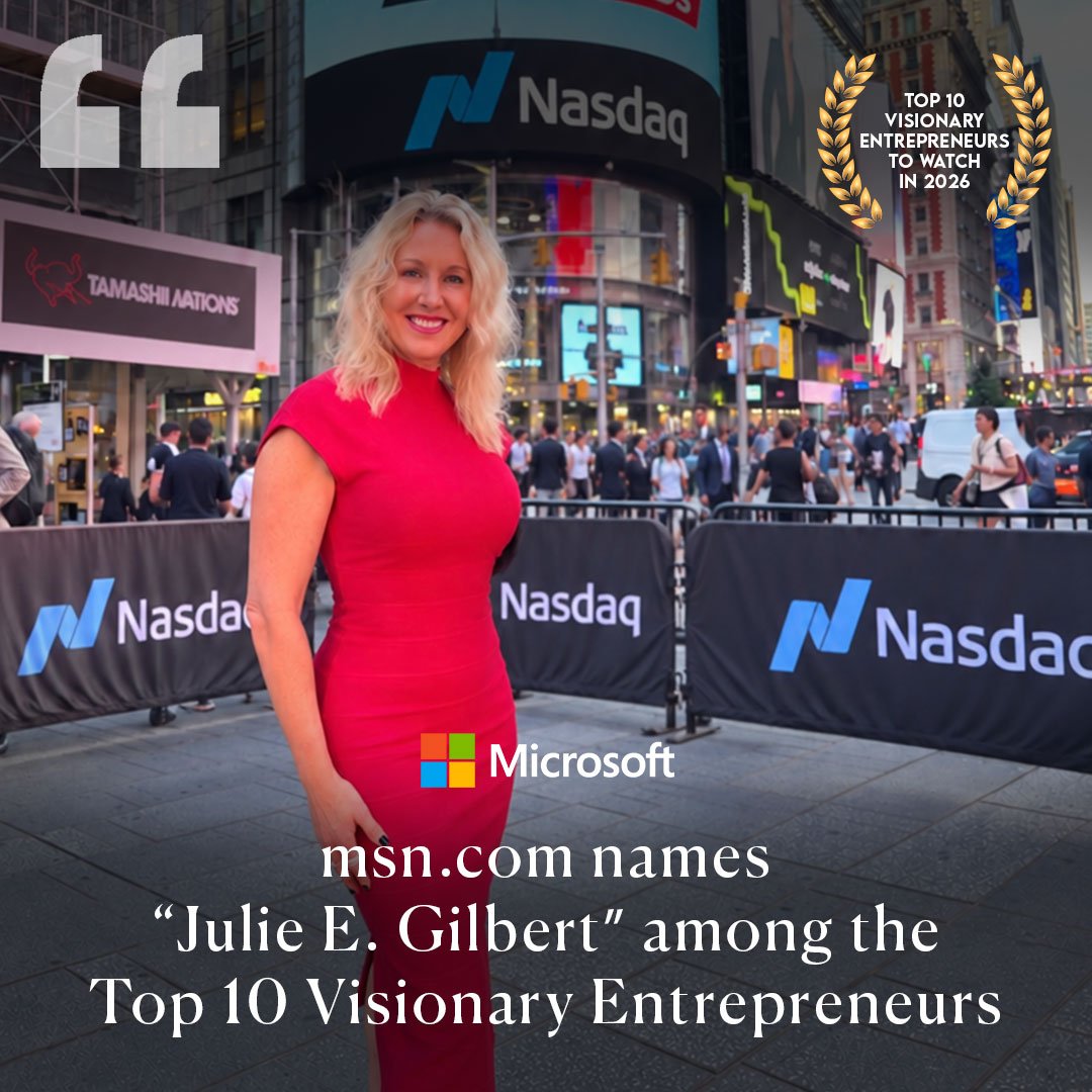 Julie E. Gilbert in Times Square in front of the Nasdaq tower, under the words msn.com names Julie E. Gilbert among the Top 10 Visionary Entrepreneurs, with a laurel badge for Top 10 Visionary Entrepreneurs to Watch in 2026
